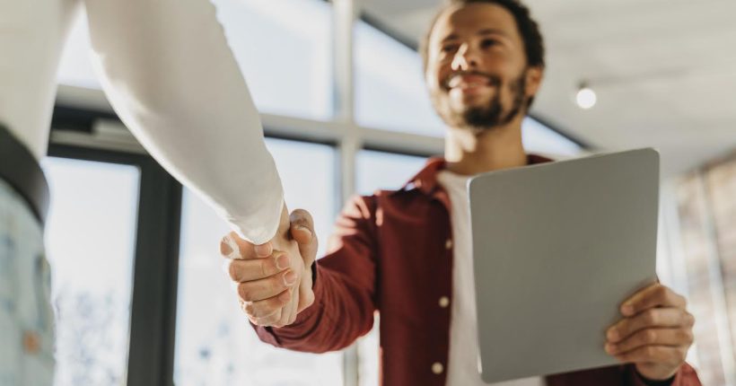 close-up-business-people-hand-shake