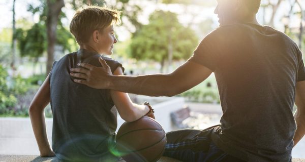 Young basketball player shoot