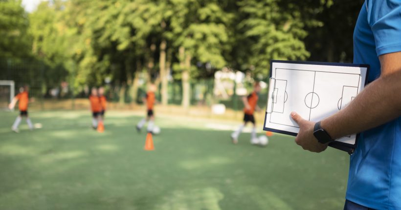 football-trainer-teaching-his-pupils (3)