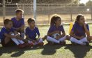 man-training-kids-playing-football-side-view (1) másolata