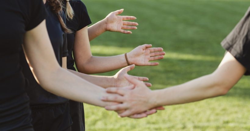 women-hands-saluting-before-match